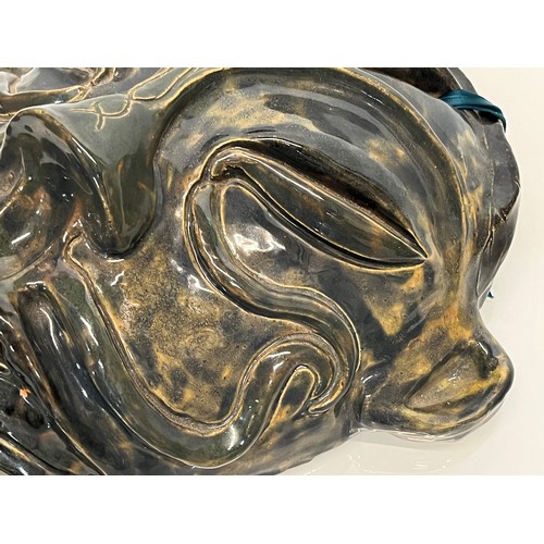 33 - Studio pottery wall mask, 30 cm tall.

This lot is available for in-house shipping