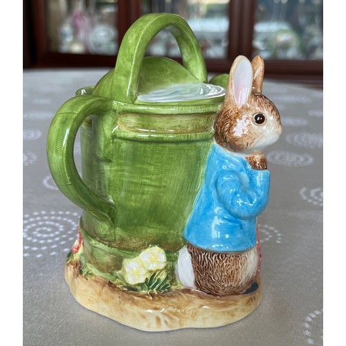 99 - Beatrix Potter collectable ceramic figurine, Border Fine Arts, Peter Rabbit in Watering Can Pot.

Th... 