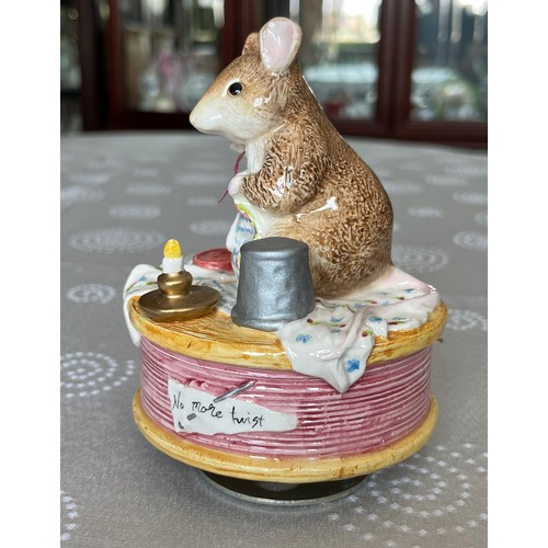 100 - Collectable ceramic figurine, musical box figurine of a mouse.

This lot is available for in-house s... 