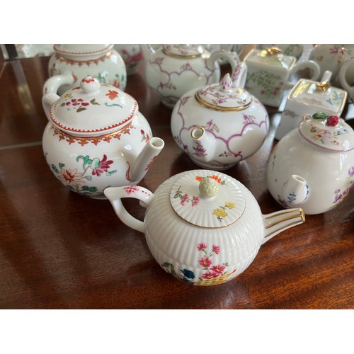 104 - Collection of 10 decorative teapots from a variety of makers.

This lot is available for in-house sh... 