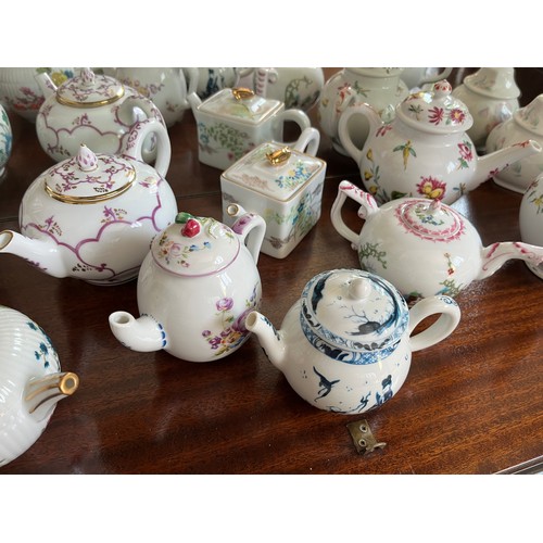 104 - Collection of 10 decorative teapots from a variety of makers.

This lot is available for in-house sh... 