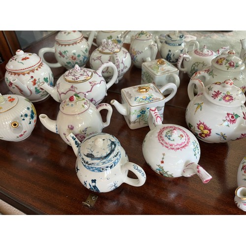 104 - Collection of 10 decorative teapots from a variety of makers.

This lot is available for in-house sh... 