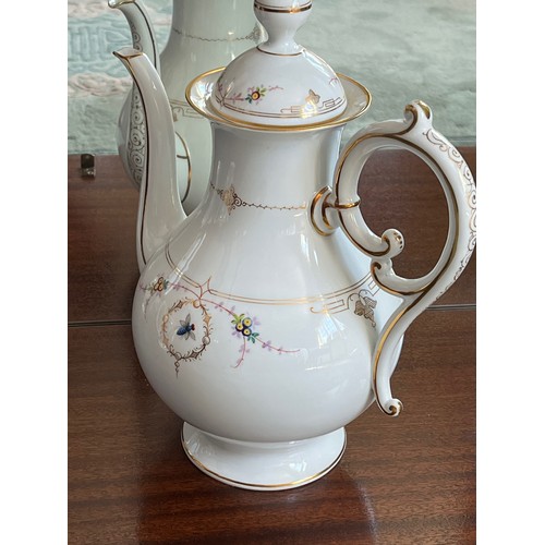 107 - Hand decorated coffee pot with gilded decoration throughout and hand painted floral patterns with be... 