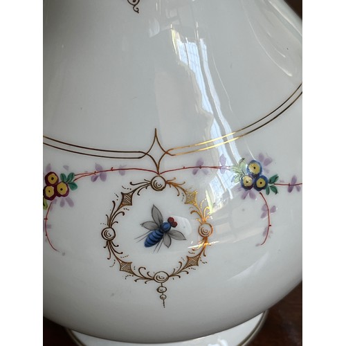 107 - Hand decorated coffee pot with gilded decoration throughout and hand painted floral patterns with be... 