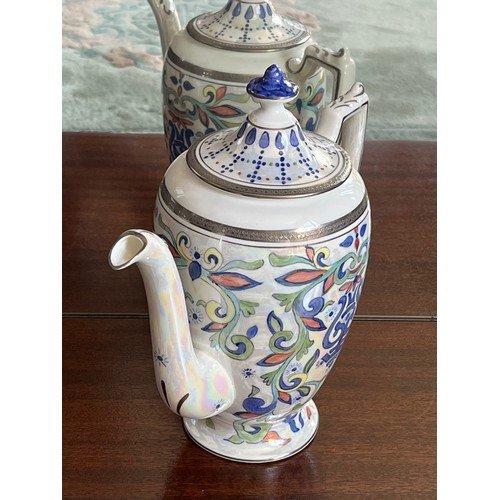 108 - Coalport bone china tea pot from the Elite Platnium range, hand painted by Petronella Britton.

This... 