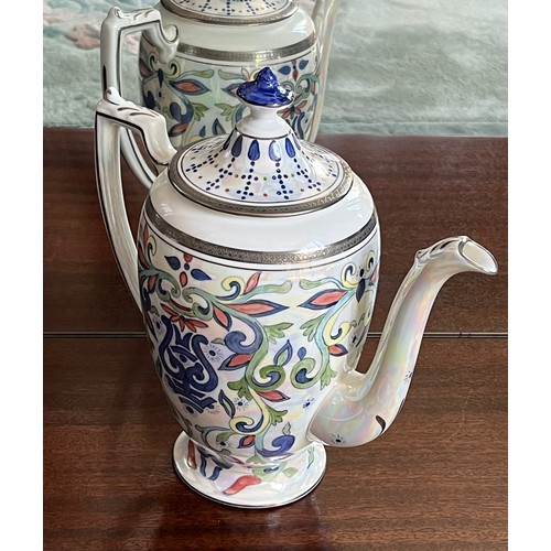 108 - Coalport bone china tea pot from the Elite Platnium range, hand painted by Petronella Britton.

This... 