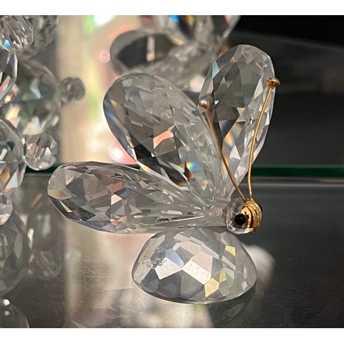 118 - Three Swarovski glass figures, Swan Teddy Bear and a Butterfly.

This lot is available for in-house ... 