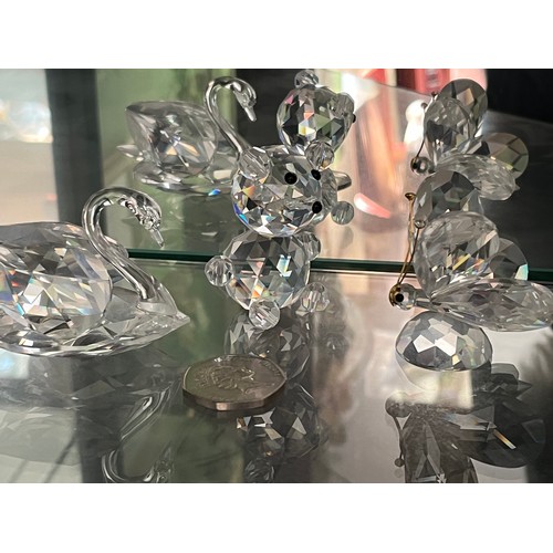 118 - Three Swarovski glass figures, Swan Teddy Bear and a Butterfly.

This lot is available for in-house ... 