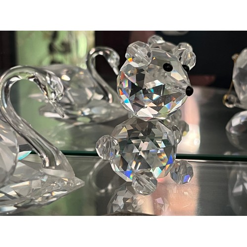 118 - Three Swarovski glass figures, Swan Teddy Bear and a Butterfly.

This lot is available for in-house ... 