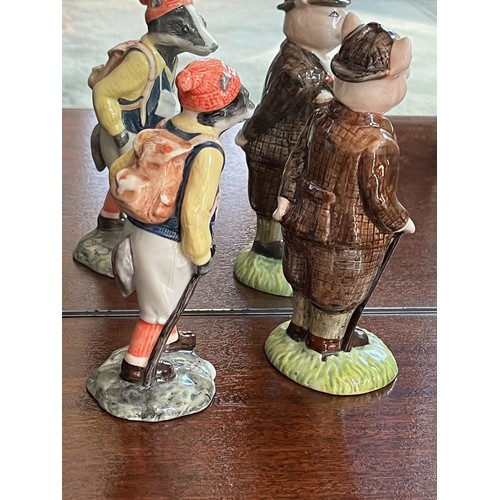 126 - Two Bunnykin’s ceramic figurines. A well dress pig and a hiking badger.

This lot is available for i... 