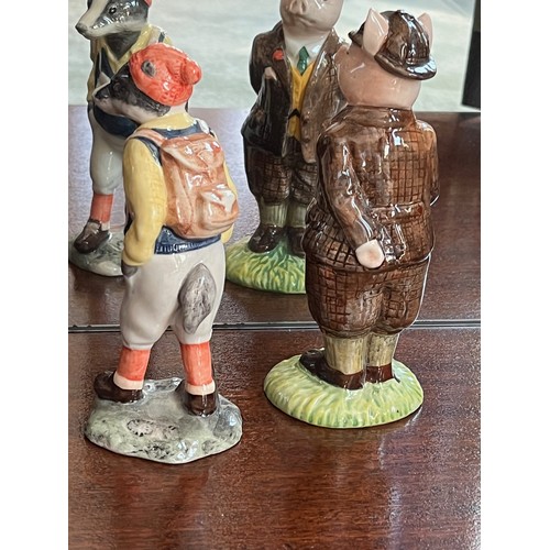 126 - Two Bunnykin’s ceramic figurines. A well dress pig and a hiking badger.

This lot is available for i... 