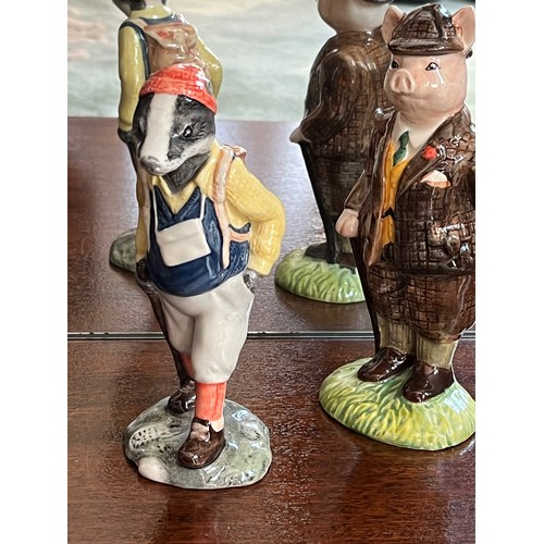 126 - Two Bunnykin’s ceramic figurines. A well dress pig and a hiking badger.

This lot is available for i... 