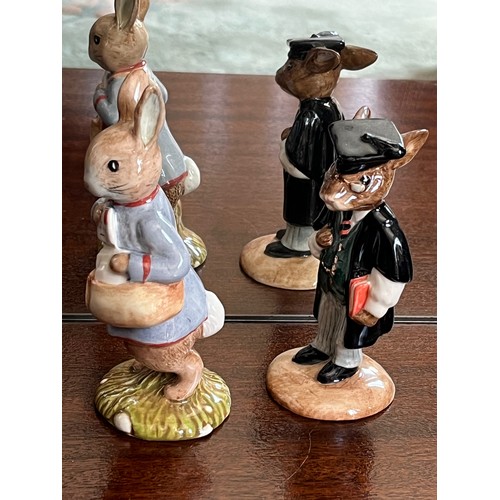 127 - Royal Doulton, Bunnykins Schoolmaster figurine and a Royal Albert Beatrix Potter figurine of Peter w... 