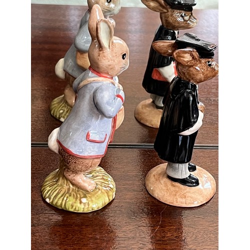 127 - Royal Doulton, Bunnykins Schoolmaster figurine and a Royal Albert Beatrix Potter figurine of Peter w... 