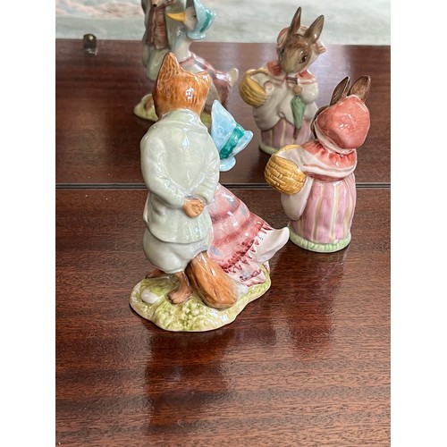 129 - Royal Albert Beatrix Potter figurines of Jemima Puddleduck with Whiskered Gentleman and Mrs Rabbit.
... 