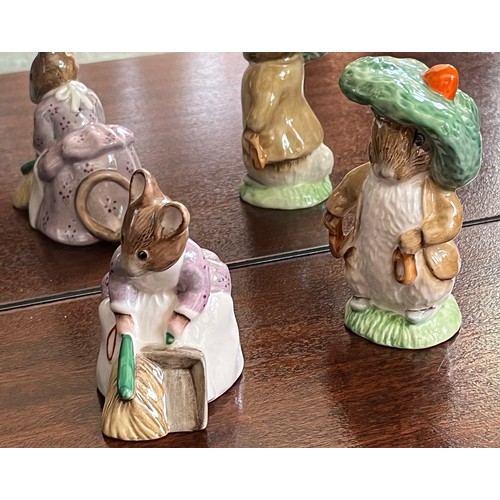 130 - Royal Albert Beatrix Potter figurine of Benjamin Bunny and Hunca Munca Sweeping.

This lot is availa... 