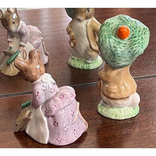 130 - Royal Albert Beatrix Potter figurine of Benjamin Bunny and Hunca Munca Sweeping.

This lot is availa... 