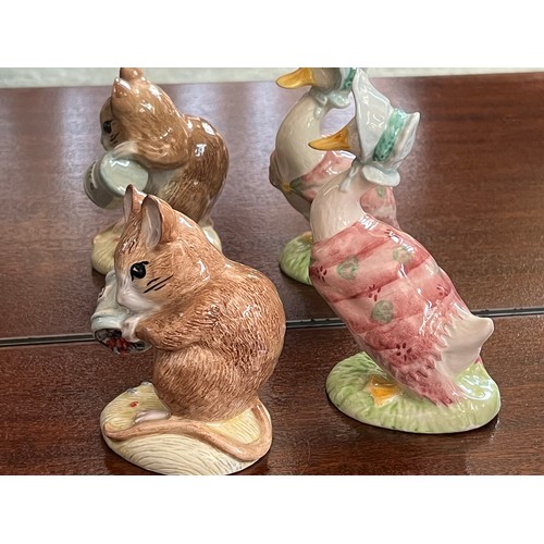 133 - Royal Albert Beatrix Potter figurine of Jemima Puddle Duck and Hunca Munca spills the beans.

This l... 