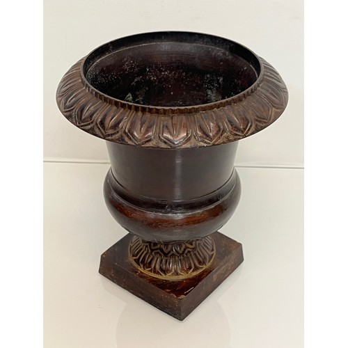 136 - Architectural antiques, a small cast bronze vase with hand chased decoration, previously in use as a... 