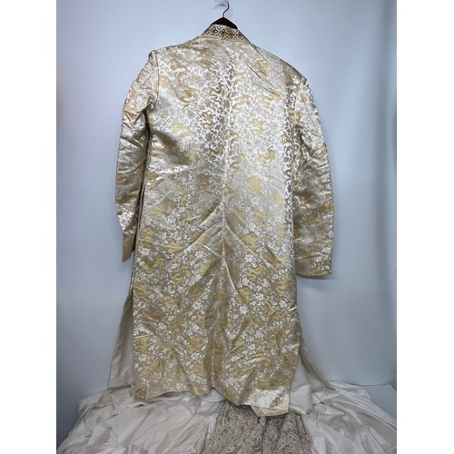 142 - Indian clothing, a collection of men’s and women’s wedding wear.

This lot is available for in-house... 