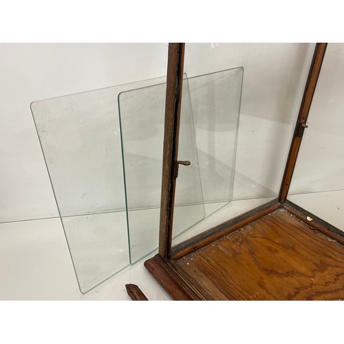 121 - Small counter top shop display case, early C20th, two glass internal shelves and single glazed door ... 