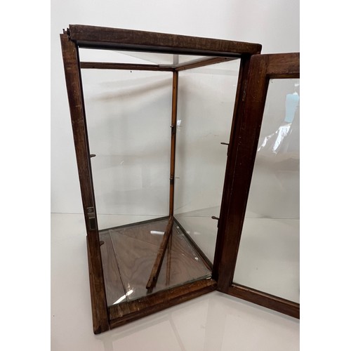 121 - Small counter top shop display case, early C20th, two glass internal shelves and single glazed door ... 