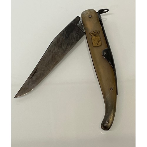 515 - Horn handled folding pocket knife marked for Corsica. 5 ½ inches long.

This lot is available for in... 