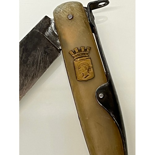 515 - Horn handled folding pocket knife marked for Corsica. 5 ½ inches long.

This lot is available for in... 