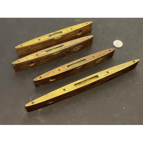 517 - Tools, from a large collection of wood working and engineering tools, Four spirit levels Rabone.

Th... 