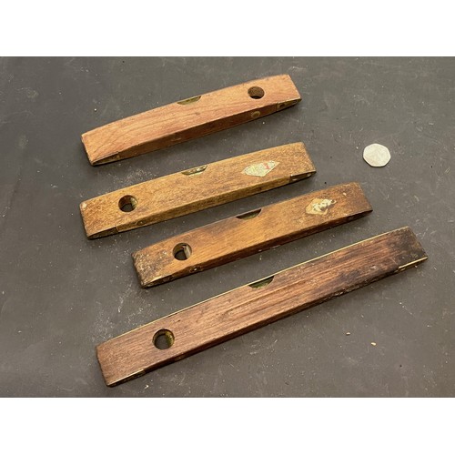 517 - Tools, from a large collection of wood working and engineering tools, Four spirit levels Rabone.

Th... 