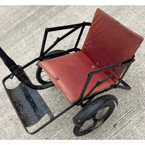 212 - Early C20th child’s folding push chair, original upholstery and enamelled finish.

This lot is avail... 