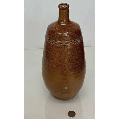 296 - Art pottery salt glazed stone wear vase. 34 cm high and 15 cm in diameter.

This lot is available fo... 