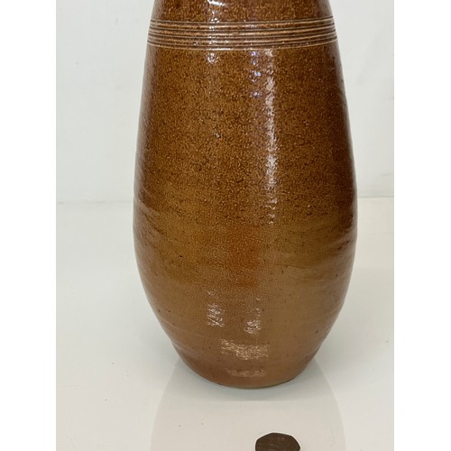 296 - Art pottery salt glazed stone wear vase. 34 cm high and 15 cm in diameter.

This lot is available fo... 