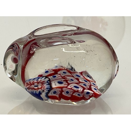 303 - Five decorative glass paper weights.

This lot is available for in-house shipping