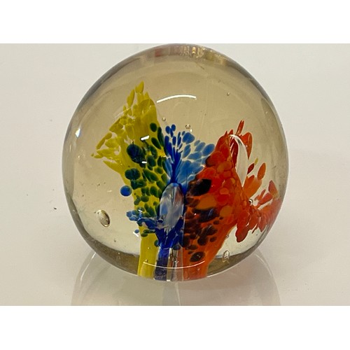 303 - Five decorative glass paper weights.

This lot is available for in-house shipping