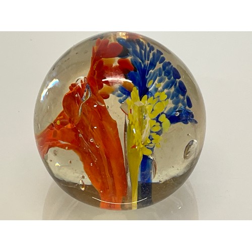 303 - Five decorative glass paper weights.

This lot is available for in-house shipping