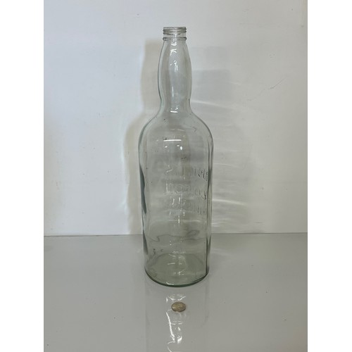 308 - Large Bells Scotch Whisky bottle. 49 cm tall.

This lot is available for in-house shipping