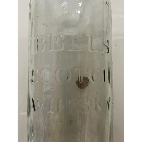 308 - Large Bells Scotch Whisky bottle. 49 cm tall.

This lot is available for in-house shipping