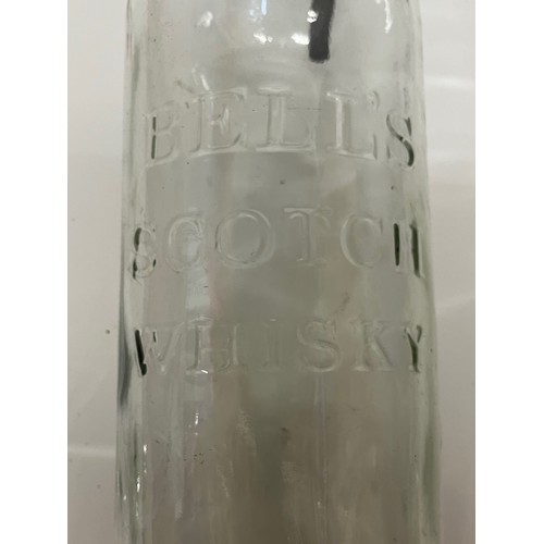 308 - Large Bells Scotch Whisky bottle. 49 cm tall.

This lot is available for in-house shipping