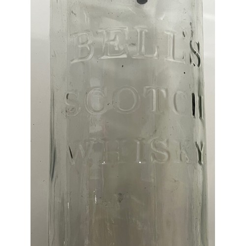 308 - Large Bells Scotch Whisky bottle. 49 cm tall.

This lot is available for in-house shipping