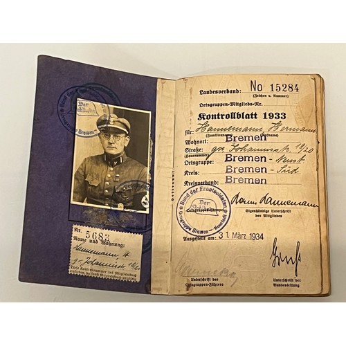 171 - Militaria, German WWI veterans ephemera, membership papers, badge, photographs and a Nazi WWII ratio... 