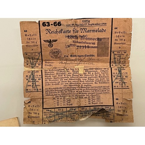 171 - Militaria, German WWI veterans ephemera, membership papers, badge, photographs and a Nazi WWII ratio... 