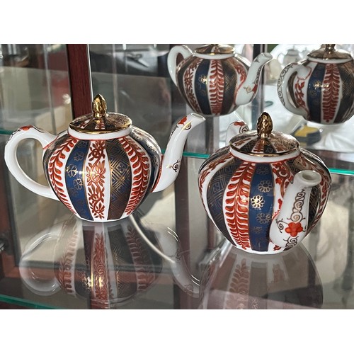 257 - A Pair of Meissen fine porcelain teapots from the Victorian and Albert Museum range.

This lot is av... 