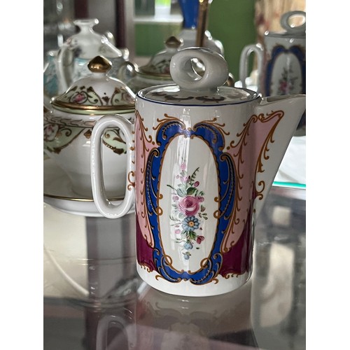 261 - Hand decorated fine porcelain, a T Limoge teapot etc .

This lot is available for in-house shipping