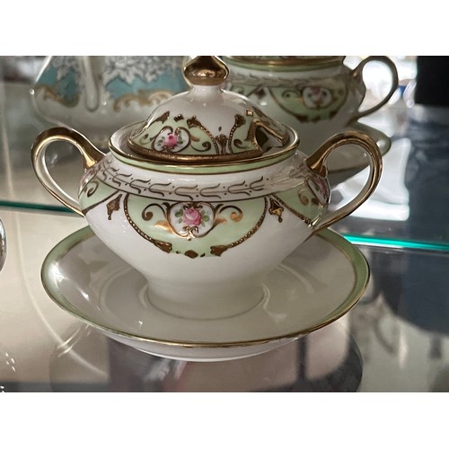 263 - Hand decorated fine porcelain comporte.

This lot is available for in-house shipping