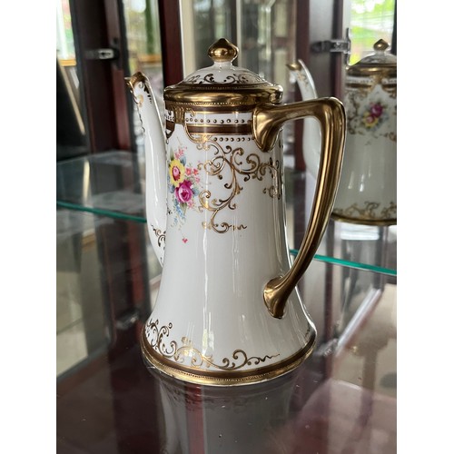 267 - Noritake fine porcelain teapot with gilded decoration.

This lot is available for in-house shipping