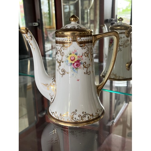 267 - Noritake fine porcelain teapot with gilded decoration.

This lot is available for in-house shipping