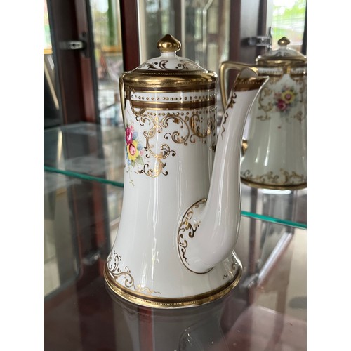 267 - Noritake fine porcelain teapot with gilded decoration.

This lot is available for in-house shipping