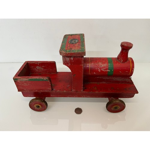 461 - Wooden ride on toy train by Freeway, 39 cm long.

This lot is available for in-house shipping