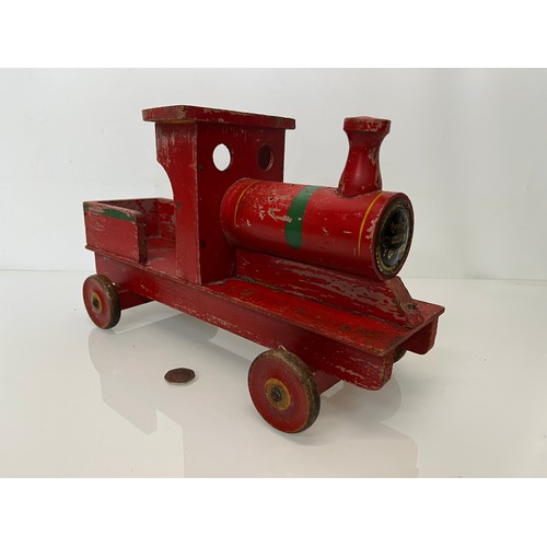 461 - Wooden ride on toy train by Freeway, 39 cm long.

This lot is available for in-house shipping